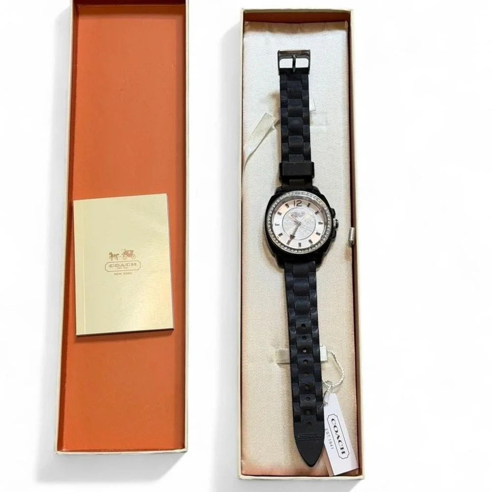Coach Black Band Watch. Rhinestones around the face‎